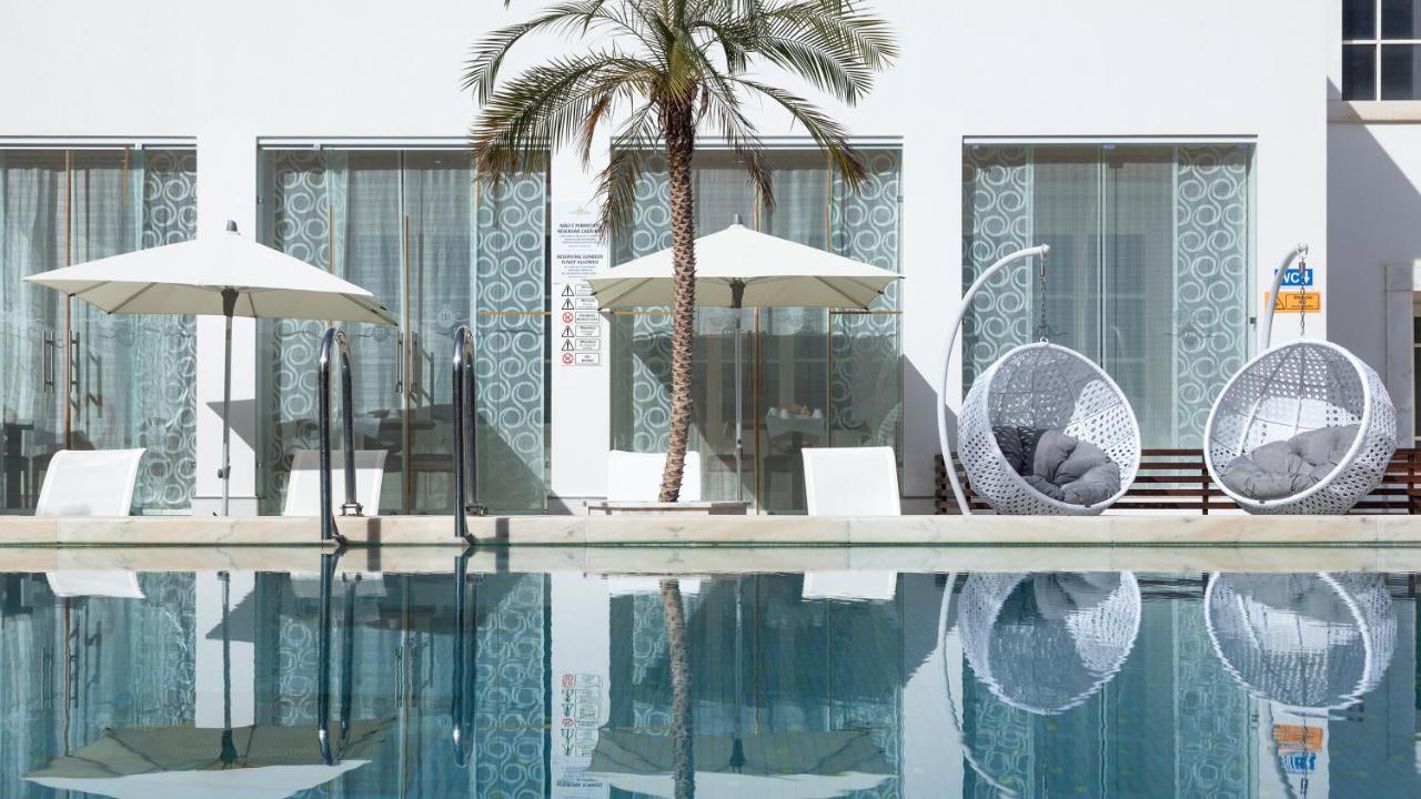 Alentejo Marmoris Hotel & Spa, A Small Luxury Hotel Of The World Vila Viçosa Zewnętrze zdjęcie The swimming pool at the hotel