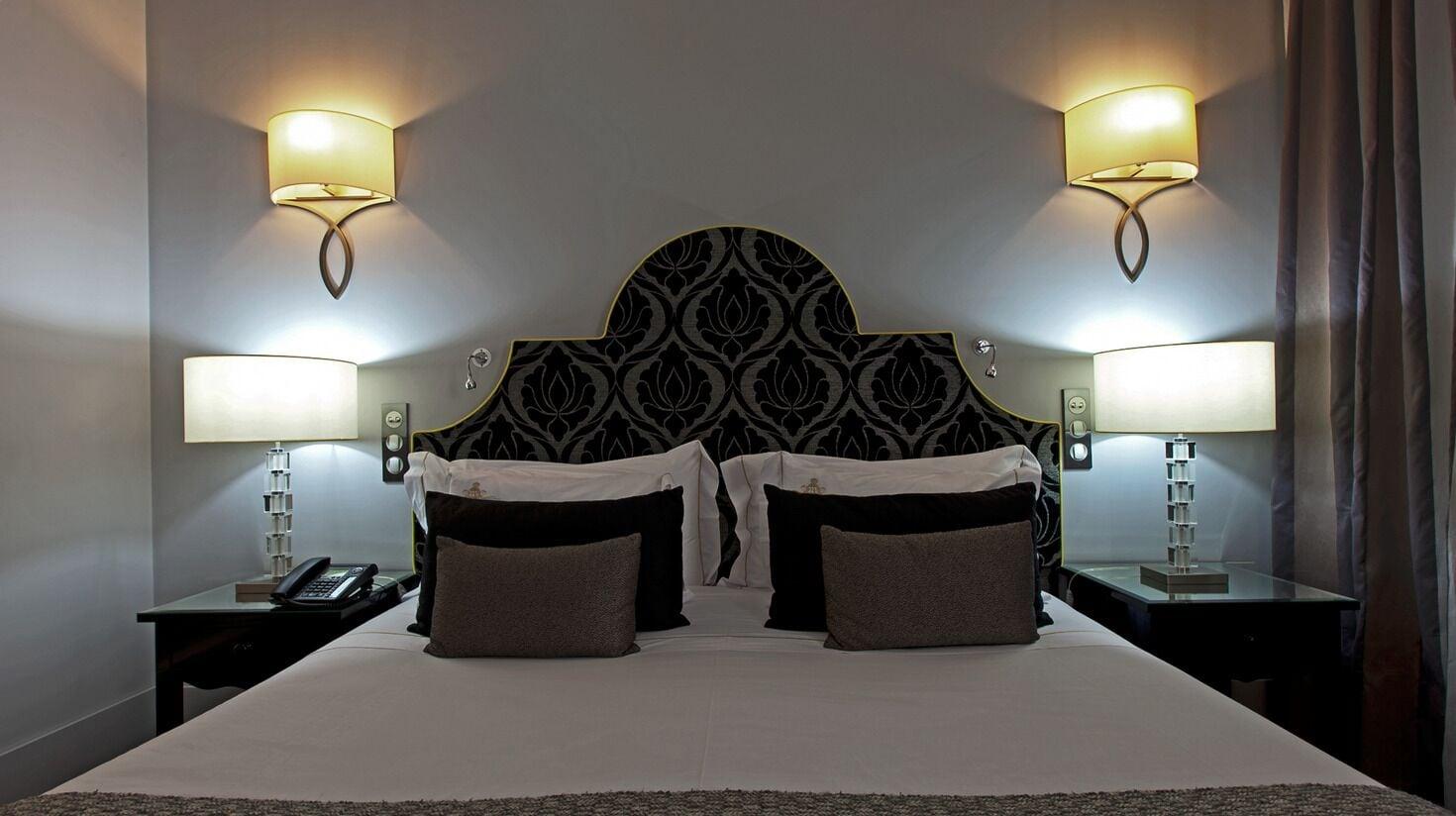 Alentejo Marmoris Hotel & Spa, A Small Luxury Hotel Of The World Vila Viçosa Zewnętrze zdjęcie A bed with a headboard